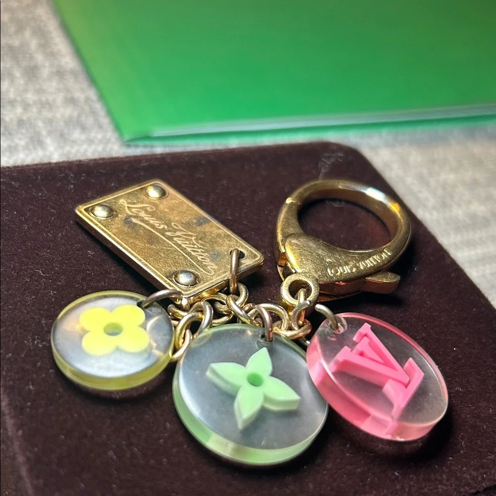 138. Louis Vuitton Gold Keychain with Pink, Yellow, Green Charms with COA
